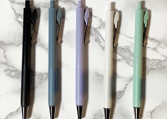 zebra blen U ballpoint pen all five colors lined up overhead shot